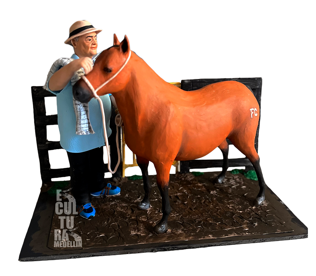ESCULTURA PEQUEÑA DUEÑO MOTILANDO CABALLO
