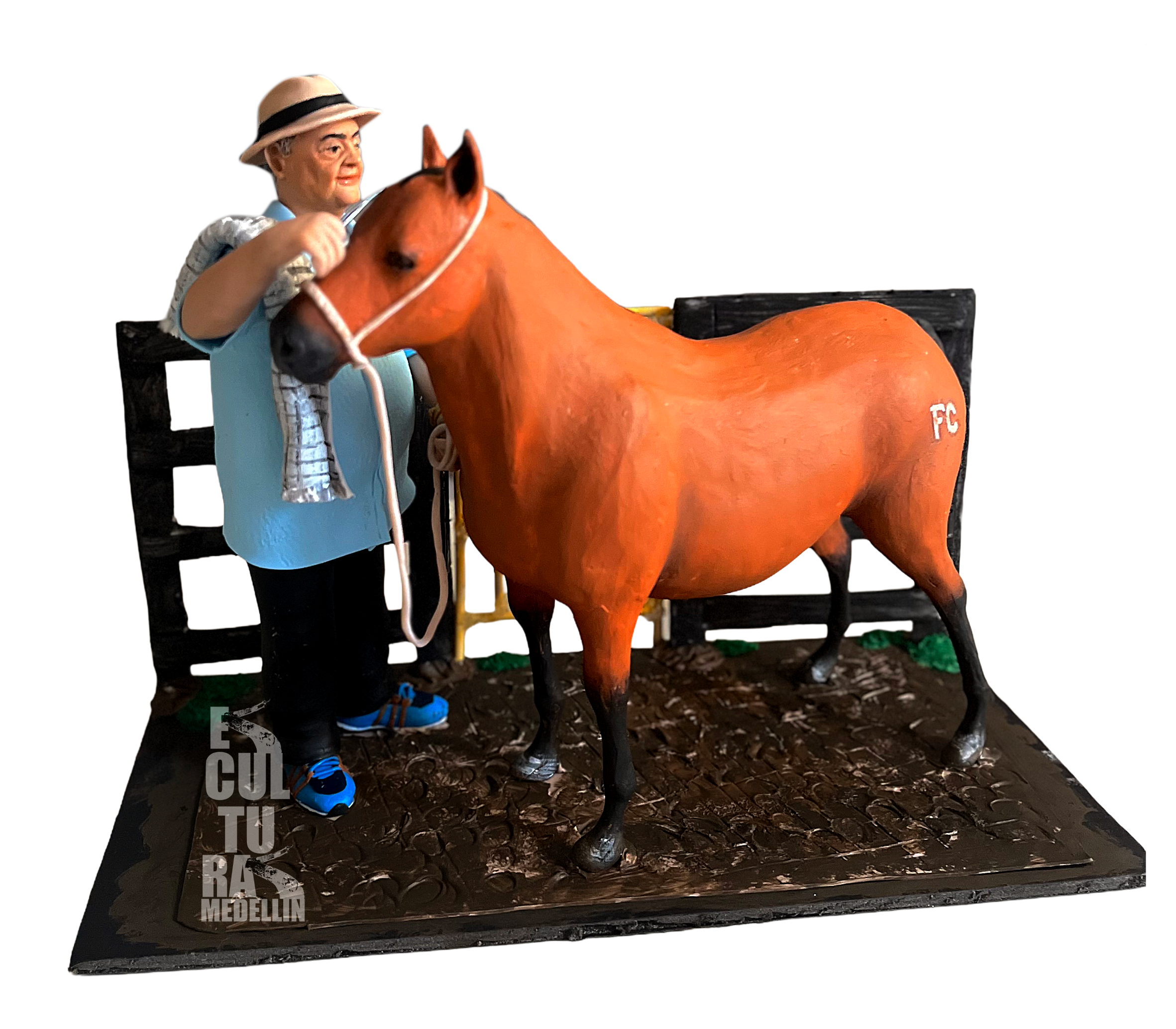 ESCULTURA PEQUEÑA DUEÑO MOTILANDO CABALLO